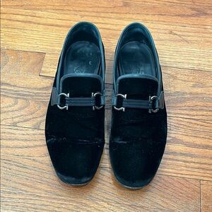 Salvatore Ferragamo Black Loafers with Silver Hardware.